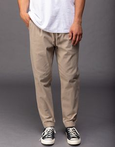 Rsq Twill Jogger Pants. Twill Jogger With 4-Way Stretch. Elastic Drawstring Waist. Side Slip Pockets. Small Right Side Zip Pocket. Back Right Welt Button Pocket. Elastic Cuffs. 97% Cotton 3% Spandex. Machine Wash. Imported.size + Fitshort: 27" – 30" Inseam Regular: 29" – 32" Inseam Tall: 31" – 34" Inseam Model Is 6'1" Wearing A Size Medium. Summer Pants With Drawstring For Everyday Wear, Everyday Spring Bottoms With Drawstring, Casual Drawstring Bottoms For Streetwear, Casual Relaxed Fit Cargo Pants With Drawstring, Casual Beige Bottoms With Comfort Waistband, Casual Khaki Bottoms With Drawstring, Casual Relaxed Fit Cargo Pants With Elastic Waistband, Casual Straight Leg Joggers With Elastic Waistband, Casual Straight Leg Cargo Pants