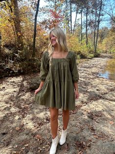 Get ready for fall with the our Willow Cotton Babydoll Mini Dress. Made from soft and breathable cotton, this dress is perfect for the cooler weather. The babydoll silhouette adds a touch of femininity, while the mini length keeps it trendy and fun. Whether you're heading to a pumpkin patch or a cozy coffee date, this dress is a must-have for your fall wardrobe. Add it to your cart now and embrace the season in style! Our short hair model is 5'4 and is wearing a size Small Green Cotton Dress For Fall, Fall Cotton Mini Dress, Cotton Mini Dress For Fall Day Out, Cotton Mini Dress For Fall, Cotton Dresses For Fall Day Out, Cute Mini Dress For Fall, Cute Fall Mini Dress, Cute Cotton Mini Dress For Fall, Cute Fall Brunch Dresses