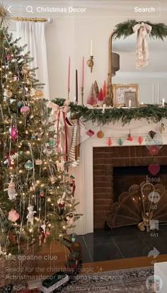 a decorated christmas tree in front of a fireplace