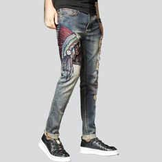 Indian head embroidery men's jeans online—cool jeans from the 2023 Spring-Summer collection. With street fashion, you can be sure that your outfit reflects your personality and values. Street-style denim clothes offer a unique look that allows you to express your individuality and stand out. Street-style denim clothing is comfortable and versatile, allowing you to mix and match different pieces to create unique looks. This clothing style is also easy to customize, so you can stay on trend withou Embroidered Denim Blue Jeans For Streetwear, Spring Embroidered Jeans For Streetwear, Embroidered Straight Leg Jeans For Streetwear, Embroidered Cotton Jeans For Streetwear, Street Mode, Embroidery Men, Denim Clothes, Jeans Street Style, Retro Jeans