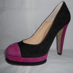 Fuchsia And Black Suede Pumps With A Contrast Cap Toe, Heel And Platform. Stitched Tonal Cc Logo At Cap Toe. Selfcovered Heel, 1" Double Layered Quilted Platform. Padded Leather Insole And Leather Sole. Made In Italy. Size: 39 Eu (Insole: 9 7/8", Heel: 4.75") Typically Chanel Shoes Run Small. Brand New In The Box. Pink Closed Toe Heels With Contrasting Heel Counter, Pink Heels With Contrasting Heel Counter And Closed Toe, Designer Pink Closed Toe Heels, Designer Pink Platform Heels, Pink Closed Toe Heels For Galas, Pink High Heels With Rubber Heel Cap, Designer Pink Heels For Galas, Chanel Pumps, Chanel Heels