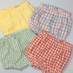 Cotton shorts for boy or girl. Either seersucker gingham, Gingham or plain cotton. Shell button detail on elasticated waist. 3-6m Waist... 6-12m Waist... 12-18m Waist... 18-24m Waist... 2-3yr Waist... From a smoke and pet free home. Summer Bottoms With Elastic Waistband For Playtime, Playful Shorts For Summer Playtime, Playful Shorts For Playtime In Summer, Playful Summer Shorts For Playtime, Cute Cotton Bloomers For Beach, Summer Playtime Bottoms Short Length, Summer Seersucker Beach Shorts, Playful Summer Playtime Shorts, Seersucker Shorts For Summer Beach