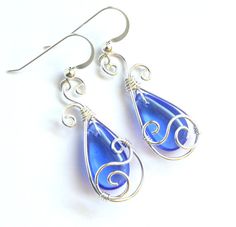 Teardrop Swirl Earrings  Royal Blue Glass by FantasiaElegance Blue Briolette Teardrop Earrings For Gift, Nickel Free Blue Teardrop Earrings, Elegant Blue Silver-plated Earrings, Blue Nickel-free Teardrop Earrings, Blue Wire Wrapped Teardrop Earrings Gift, Harpers Ferry, Swirl Earrings, White Brass, Wire Earrings