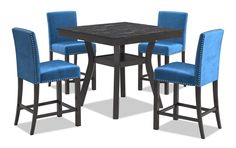 a table and four chairs with blue fabric upholstered on the backrests