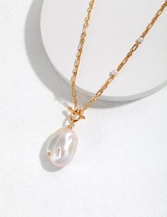 Sterling Silver Baroque Pearl  Necklace | Gold Chain | Bridal jewelry | Handmade jewelry L A R G E ∙ B A R O Q U E ∙ P E A R L ∙ E A R R I N G S / N EC K L A C E S / B R A C E L E T S   ✦ Materials: Baroque pearls & 18k golden plated stainless silver 925 ( highest quality） ✦ Pearl Size: Featuring 35-39mm Baroque Pearls ⭐（we use natural pearls, so each pearl is not Will be like the picture, just similar）     A pair of pearl earrings with a minimalistic approach for everyday wear 🎁All of our items are nicely packaged and ready to gift in jewelry boxes. 🚗Please allow 1-3 business days before the item ships out with TRACKING， and shipping time is 5~12 business days.       Thank you so much for your understanding。 Due to the variation of natural freshwater baroque pearls, please expect slight Baroque Pearl Pendant, Gold Baroque, Pearl Chain Necklace, Necklace Stand, Baroque Pearl Necklace, Gold Pearl Necklace, Sterling Silver Chain Necklace, Chain Design, Delicate Chain