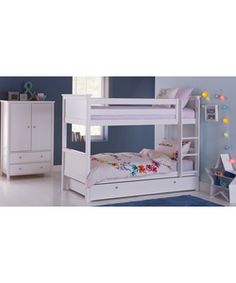 a white bunk bed sitting in a bedroom next to a dresser