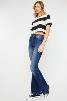 Our Cinthia Ultra High Rise Jeans come in a superflare cut with a raw, released hem that creates a chic, rustic look. Sits high above the natural waistline as it tapers down the thigh and begins to flare out at the calf. Made with stretch denim that holds its shape and allows you to move with ease. Features a classic five-pocket design, single-button front, and zip-fly closure. 11.25" Rise / 33.5" Inseam (Size 3/25) 68% Cotton, 27% Polyester, 3% Rayon, 2% Spandex Model in size 3/25 Style # : KC7896D Style # : KC7896M Stretchiness Level >> Stretch Super Flare Jeans, High Rise Jeans, Pocket Design, Flare Jeans, Stretch Denim, Dark Blue, High Rise