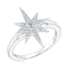 The Radiant Universe Collection seeks to capture the nature of celestial bodies and infuse that powerful energy into your every day style. Crafted in 10k white gold, this Radiant Universe Celestial Diamond North Star Ring boasts sparkling diamond accents along its starburst design. Diamonds are 1/4ctw, I in color, and I2 in clarity. This ring measures 20mm across the top and 2mm across the bottom. Celestial White Gold Diamond Ring, Silver Star-shaped Celestial Diamond Ring, Celestial Silver Star-shaped Diamond Ring, Celestial Star-shaped Silver Diamond Ring, Celestial Silver Diamond Ring With Accents, Celestial Style Silver Diamond Ring With Accents, Celestial Style Silver Diamond Ring, North Star Ring, Gothic Ring