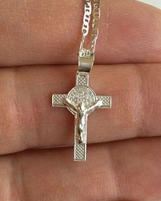 "925 STERLING SILVER SAINT BENEDICT CROSS NECKLACE . 20\" LONG GUCCI CHAIN. FOR GOOD LUCK ,PROSPERITY AND PROTECTION. PENDANT SIZE: 25 mm X 13 mm CADENA DE 925 PLATA ESTERLINA SAN BENITO CRUZ. CADENA 20\" LARGO GUCCI. PARA BUENA SUERTE ,PROSPERIDAD Y PROTECCIÓN... TAMAÑO DEL DIJE : 25 mm X 13 mm" Sterling Silver Cross Charm Necklace, Silver Sterling Cross Pendant Charm Necklace, Silver Sterling Charm Necklaces With Cross Pendant, Silver Crucifix Necklace With Charms, Personalized Silver Crucifix Jewelry, Sterling Silver Crucifix With Silver Chain, Sterling Silver Crucifix Charm Jewelry, Stamped 925 Crucifix Necklace For Gift, Silver Sterling Silver Crucifix Necklace