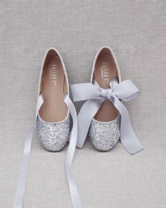 "Comfy and sparkly allover rock glitter ballet flats and with satin ribbon tie strap. Definitely will brighten up everything you wear. Perfect for bride and bridesmaids for comfy wear during wedding or after to change into. YOU CAN CHOOSE ON STYLE IF SHOES: BALLERINA LACE UP OR MARYJANE TIE DETAILS: SATIN LACE WIDTH: BALLERINA LACE UP (7/8 INCH) & MARYJANE TIE (1.5 INCHES) COLORS AVAILABLE: Gold, Silver, White, Rose Gold, Red and Navy UPPER: Synthetic upper and lining MATERIALS: Mandmade outsole Glitter Party Flats With Round Toe, Glitter Flats With Round Toe For Party, Glitter Round Toe Flats For Party, Party Silver Ballet Flats With Pointed Toe, Silver Pointed Toe Ballet Flats For Party, Silver Round Toe Ballet Flats For Evening, Silver Closed Toe Ballet Flats For Party, Silver Ballet Flats For Party With Round Toe, Glitter Flat Heel Wedding Shoes For Party