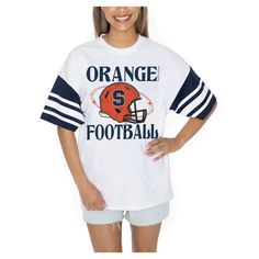 Showcase your Syracuse Orange pride in style with the Gameday Couture Starting Lineup Contrast Sporty Heritage Oversized T-Shirt. The oversized fit provides a trendy and relaxed look, making it perfect for game day or any casual occasion. Made from 100% cotton, this tee offers exceptional comfort and breathability, ensuring you stay cool and confident while cheering on the Syracuse Orange. Spring Varsity T-shirt With Graphic Print, Sporty Oversized T-shirt For Game Day, Oversized Graphic Tee For Game Day, Oversized Sporty T-shirt For Game Day, Oversized School Spirit T-shirt With Letter Print, Oversized Varsity T-shirt With Letter Print, College Style Short Sleeve T-shirt For Game Day, Oversized Varsity T-shirt For Game Day, Oversized Crew Neck College Style T-shirt