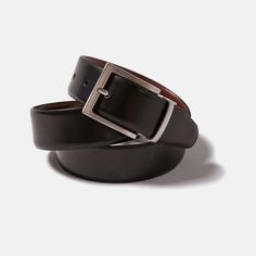 Reversible leather belt by Kirrin Finch coiled upon itself. Showing Black leather side and zinc belt buckle. Kirrin Finch, My Best Friend’s Wedding, Walker Slater, Androgynous Look, Reversible Belt, Menswear Inspired, Belt Buckle, New Shop, Belt Buckles