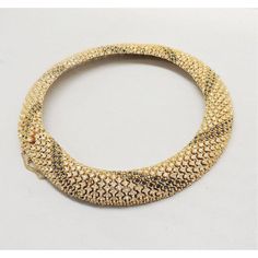 This is part of Chairish’s Costume Jewelry assortment.  1950s goldtone prong set clear rhinetones with faux-sapphire stripes collar necklace with box clasp and security chain. Marked "Ledo." Interior circumference about 14 inches. Center; 7/8 inches long. Condition: Very good; perhaps there are a few stones with wear but most are sparkly and it's hard to tell. This is virtually identical to necklaces made by Ciner in terms of construction and weight.  Please reference the measurements noted in t Gold Crystal Diamond Necklace, Dazzling Gold Diamond Necklace With Jewels, Gold Tennis Necklace For Party, Dazzling Gold Rhinestone Necklace For Formal Occasions, Dazzling Gold Necklaces For Evening, Gold Round Diamond Necklace For Evening, Formal Gold Diamond Necklace With Sparkling Stones, Gold Round Rhinestone Costume Necklace, Gold Luxury Rhinestone Necklace For Formal Occasions