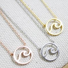 Dainty wave necklace.... Tiny and dainty gold / silver / rose gold wave charm necklace is great to wear for everyday or special occasions Available in gold and silver and rose gold Material Gold plated Silver plated Rose gold plated SIZE ♥ Pendant size : 11 mm diameter ♥ Chain size : 16.5 '' ( as pictured ) Please CHOOSE one the description of length below before check out ! * necklace sizes * 15 inches: around neck 16 inches: standard short 17 inches: average length 18 inches: standard long CAU Silver Wavy Necklace For Gift, Wave Necklace, Gold Waves, Bridesmaid Necklace, Necklace Sizes, Gold Plated Silver, Silver Roses, Silver Rose Gold, Bridesmaid Gift