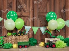 a tractor and some balloons on a table