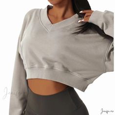 Loose-Fit Long-Sleeve Solid Color Casual Sweatshirt Top Trendy Long Sleeve Top With Cozy Fit, Gray Fitted Long Sleeve Sweatshirt, Athleisure V-neck Tops For Fall, Fall V-neck Athleisure Tops, Casual Long Sleeve Solid Color Crop Top, Cozy Fit Gray Top For Fall, Gray Cozy Fit Top For Fall, Spring Long Sleeve Athleisure Tops, Fall Workout Tops With Crew Neck