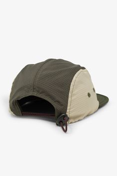 The MNML Active Hat is made from 100% polyester ripstop, featuring an adjustable bungee cord closure for a custom fit. It includes perforated side panels for breathability and is finished with a MNML woven label at the crown. details Style: Standard Fit Style: Elastic Closure Composition: 100% polyester Olive Green Hat, Outdoor Hat, Hiking Hat, Sports Cap, Raglan Hoodie, Camp Style, Work Accessories, Handbag Essentials, Cap Patterns