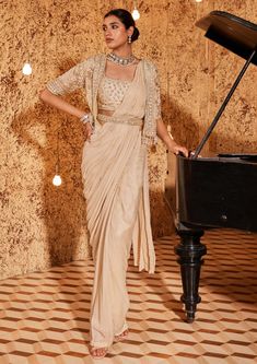 Nidhika Shekhar-Golden Draped Sari And Cape Set-INDIASPOPUP.COM Saree Cape, Saree Jacket Designs, Gold Organza, Golden Gown, Saree Jackets, Cape Set, Lehenga Designs Simple, Modern Saree, Fancy Sarees Party Wear