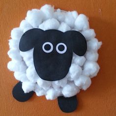 the sheep is made out of foam and yarn