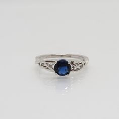 Vintage Celtic Sterling Silver Blue Sapphire Band Ring ...Marked 925...Total of weights 2.0grams...Size 8...Measure of stone 5.9MM...It's in very good condition. Sapphire Band Ring, Sapphire Band, Blue Sapphire Ring, Blue Sapphire Rings, Silver Blue, Band Ring, Blue Sapphire, Sapphire Ring, Band Rings