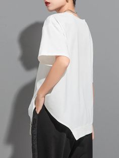 Casual Chic : T-shirt ample à manches courtes et col rond asymétrique Casual Asymmetrical T-shirt For Spring, White Asymmetrical T-shirt For Summer, Asymmetrical Hem Solid Color Summer Blouse, Summer Asymmetrical Hem Solid Color Blouse, Summer Blouse With Asymmetrical Hem, Casual Asymmetrical Solid Color Blouse, Summer Cotton T-shirt With Asymmetrical Hem, Cotton T-shirt With Asymmetrical Hem For Summer, White T-shirt With Asymmetrical Hem For Spring