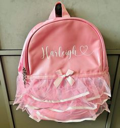 Personalised Girls Pink Tutu Bag - perfect for nursery, schools or extra curricular activities!  Bag is approximately 32x26x12cm, an ideal size for little ones.  Bag will be personalised with a name or your choice of wording in your choice of coloured vinyl. Cute Backpack For End Of School Year, Cute School Bags For Back To School, Student Backpack With Cute Design, Pink Bags For Back To School Gift, Cute Design Backpack For Students, Softback School Bag For Back To School, Softback Bag For Back To School, Back To School Softback Bags, Cute School Backpack With Adjustable Strap