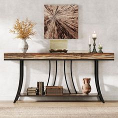 The console table showcases a contemporary design with rustic appeal. It has a dark, metal frame with elegant curves supporting a thick, wooden slab top that has a natural, uneven grain finish. The wood's warm, earthy tones contrast with the sleek black metal. Below the main top, there is a matching wooden lower shelf providing additional storage space. The design balances industrial and natural aesthetics, making it versatile for various decors. Narrow Farmhouse, Industrial Hallway Table, Extra Long Console Table, Console Table With Storage, Narrow Sofa Table, Long Sofa Table, Long Console, Long Console Table, Farmhouse Console Table