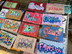 many different types of graffiti are on display in a market stall, including toothpicks