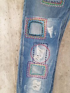 "Ready to send:Size 34 ,33,32,31 Unique vintage jeans with apcycled patches. One of a kind.. Hand made embroidery and unique painting .... ---Or---- Made to order, in any size, within 12 working days . If you need different size, please send me a message and I will make you a special and unique design within 12 working days. They are all different! No one will have the same one as you have! Hand painted, one of kind jeans. You pick your size, model (slime- boyfriend- high waist- low waist) and p Multicolor Straight Leg Denim Pants, Multicolor Jeans With Pockets, Vintage Straight Leg Bottoms With Collage Stitching, Blue Cotton Bottoms With Collage Stitching, Vintage Bottoms With Collage Stitching And Straight Leg, Redone Jeans, Palazzo Jeans, Pants Custom, Patched Denim Jeans