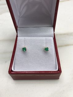 AAA+ fine quality Colombian emerald studs set in 14K yellow gold. vivid-green emeralds with incredible transparency, accented by a simple double-prong 14k yellow gold mount, allowing for the emerald to be shown in full view. The earth mined, green Colombian emeralds have a desirable lush green color with excellent qualities. These earrings are ideal for everyday use and are the perfect accessory to any outfit. Total Carat Weight: 0.24tcw Setting Style: Double Prong Setting Material: 14K Yellow, Emerald Studs, Emerald Stud Earrings, Emerald Earrings Studs, Earrings Round, Colombian Emeralds, Gold Baby, Stud Set, Emerald Earrings, Emerald Jewelry