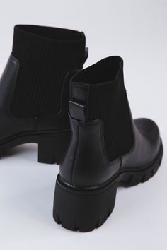 Step out in style with Zordy Ribbed Ankle Lug Sole Chelsea Boot! Featuring a Lug Sole for added traction, and a ribbed material construction on the sides, this boot has the perfect combination of style and comfort. With a 2.5" heel and 5.5" shaft, these boots make a statement that won't be ignored. Make your first impression unforgettable with Zordy! General Info: Lug Sole Ribbed Material Sides 2.5" Heel 5.5" Shaft Black Chelsea Boots, Chelsea Boot, First Impression, Lug Sole, Clothing Company, Chelsea Boots, Chelsea, Make Your, Boots