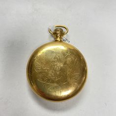 "f895 Antique Illinois Gold Tone Mechanical Pocket Watch Pre-owned item. Please see pictures for details. Sold as is, as seen on pictures, no returns on vintage/antique items. We do not alter/polish antique items and try to keep items as original as possible. Watch were checked and serviced, good working condition. Antique Illinois Watch Co. Springfield Mechanical Pocket Watch. Gold tone. Movement #2034301. Dial shows some damage at 5 o'clock, please see pictures. Approx. measurements. 47mm in d Antique Yellow Gold Pocket Watch Collectible, Vintage Yellow Gold Chronometer Watch, Vintage Yellow Gold Round Watch Accessories, Antique Chronometer Watch, Antique Gold Round Watch, Antique Gold Watches With Chronometer, Antique Round Watches For Wedding, Vintage Engraved Watches For Wedding, Vintage Engraved Wedding Watch