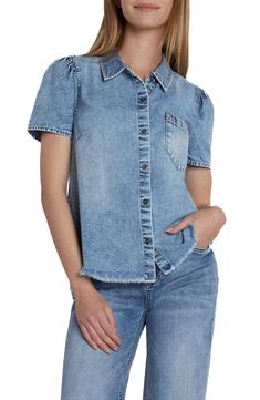 Charming puff sleeves frame this casual-cool denim shirt punctuated with a feathery frayed hem. 24" length Spread collar Short sleeves 100% cotton Machine wash, tumble dry Imported Spring Tops With Frayed Hem For Casual Gatherings, Medium Wash Cotton Puff Sleeve Top, Trendy Light Wash Denim Top With Frayed Hem, Trendy Cotton Denim Top With Puff Sleeves, Spring Cotton Shirt With Frayed Hem, Denim Blue Cotton Puff Sleeve Tops, Trendy Washed Chambray Tops, Medium Wash Trendy Denim Top With Puff Sleeves, Trendy Relaxed Fit Denim Top With Frayed Hem