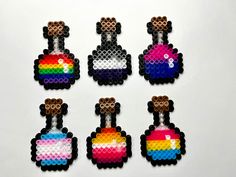 six pieces of pixel art made to look like video game characters, each with an 8 bit rainbow