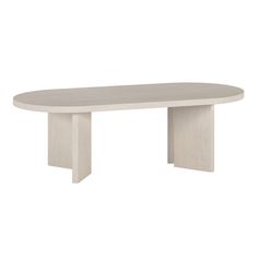 a white table with an oval shaped top