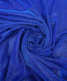 Royal Blue Lurex Fabric,Blue Glitter Spandex Knit Fabric, Blue Sparkle Fabric, Shimmer Fabric by the Yard. Our Metallic Lurex Fabric s full of glitter which gives it a beautiful shine and sparkle. Featuring a two-way stretch for flexibility and ease of movement, this fabric is adorned with metallic glitters that create a shimmering, iridescent effect. Perfect for a range of projects including evening wear, dance costumes, party apparel, and decor, this fabric is designed to make a statement with Glamorous Blue Sequin Fabric For Party Season, Luxury Blue Sequin Fabric For Party, Fitted Blue Sequin Fabric With Glitter, Glamorous Sparkling Blue Sequin Fabric, Light Blue Glitter Fabric, Sparkle Fabric, Shimmer Fabric, Lurex Fabric, Stretches For Flexibility