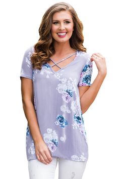 The best-selling crisscross style now in a beautiful light purple and floral print that is perfect for spring! Super soft knit, short sleeves, elegant summer top with crisscross V-neckline. Made of stretchy fabric, it is quite well received by women for cool and fresh summer styling! * Lightweight and breathable, very soft stretch fabric * Simple, chic and delightful top for spring and summer * Short sleeves, V-neck crisscross neck and floral print all over * Polyester/ Spandex Size Chart (Inche Purple Floral Print, Cheap Blouses, Wholesale Shirts, Floral Tee, Knit Short, Cheap Fashion, Women Clothing Boutique, Womens Fashion Trends, Summer Top