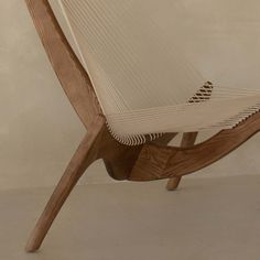 a chair made out of wood and fabric