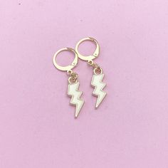 These are gold-toned Lightning on stainless steel ear hooks. ♥ You will get one pair. HOW TO ORDER 1) Choose the quantity. 2) Choose the style in the option or add a note to seller at checkout. 3) Add to the cart. DESCRIPTION ♥ (Real 18K Gold Plated) 304 Stainless Steel Dangle Earrings, Size: about 0.67 inch(17mm) long, 0.71 inch(18mm) wide, 0.09 inch(2.4mm) thick OR ♥ (Ion Plating (IP) )304 Stainless Steel Leverback Earring Findings, with Loop, Golden, Size: about 12mm wide, 14.5mm long, 0.6mm Lightning Earrings, Gold Lightning, Manufactured Stone, Red Tigers Eye, Jewelry Card, Earring Findings, Oils For Skin, Quartz Crystal, Jewelry Earrings Dangle