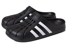 adidas Adilette Clog - Shoes : Black/White/Black : For a casual, cool vibe, head to your work out in the comfy adidas Adilette Clog. Based on the iconic adidas slide, these sport-inspired clogs have a soft feel and are both functional and comfortable featuring a contoured EVA footbed. Sport-inspired clogs with a soft feel. Slip-on construction. Contoured EVA footbed. Regular fit. Upper, lining, insole, and outsole made of synthetic material. Imported. Measurements: Weight: 5 oz Product measureme Sporty Breathable Clogs For Sports, Sporty Synthetic Slip-on Clogs, Sporty Fade-resistant Clogs For Sports, Sporty Black Fade-resistant Clogs, Adidas Logo Slip-on Slides, Adidas Logo Synthetic Slides For Sports, Black Adidas Slides With Logo, Black Adidas Logo Slides, Casual Adidas Slides For Sports