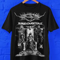 Babymetal graphic t-shirt for fans of J-Pop, K-Pop, heavy metal music. Great gift for J-Pop Metal Fans Bella+Canvas 3001 * 100% Airlume combed and ringspun cotton (fiber content may vary for different colors) * Light fabric (4.2 oz/yd² (142 g/m * Retail fit * Tear away label * Runs true to size With side seams Located along the sides, they help hold the garment's shape longer and give it structural support Shoulder tape Twill tape covers the shoulder seams to stabilize the back of the garment an Rock Style T-shirt With Band Logo For Music Festivals, Metal Band Merch, Band Merch T-shirt With Sublimation Print, Band Merch T-shirt For Concert, Black Band Logo T-shirt For Concert, Rocker Band Logo T-shirt With Short Sleeves, Rock Style Band Logo T-shirt For Streetwear, Rocker T-shirt With Band Logo And Short Sleeves, Alternative Band Logo Tops For Music Festivals