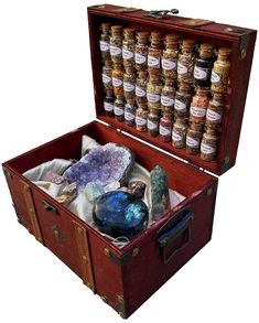 PRICES MAY VARY. Perfect for starting your journey as a witch or continuing your existing practice. This kit includes a wide variety of crystals such as amethyst, labradorite, and fluorite as well as a variety of raw stones such as: Amazonite, Jasper, and tourmaline as well as quartz. Featuring 27 varieties of unique herbs you can use in loose incense, sachets, or spell jars. These herbs are displayed in 8ml glass jars with corks. Also includes a keepsake wooden box with a metal latch and handle Witchcraft Altar, Wiccan Altar, Mirror Box, Witchcraft Spell Books, Witchcraft Supplies, Indoor Fountain, Glass Vials, Spells Witchcraft, Brass Bells