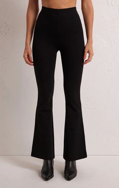 We love a good flare pant and the Do It All Flare Pant has it all! This chic high rise pant features a slim fit throughout the hips, a kick flare, and our fave detail; the supportive feel from the durable, stretchy fabric. Fit and flare Mid Weight Ponte: 62% Rayon, 33% Nylon, 5% Spandex Flare leg detail Pull on Elastic Waist Unlined Mid-weight Ponte Wash Cold, Hang Dry Lounge Bra, Athleisure Tops, Silk Bottoms, Flare Pant, The Perfect Girl, Leather Denim, Kick Flares, High Rise Pants, Some Girls