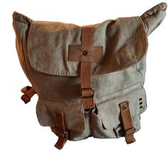 Urban Tan/Brown Backpack Mossimo Brand New Condition Casual Brown Satchel For School, Brown Backpack Shoulder Bag With Pockets, Brown Shoulder Backpack Bag With Pockets, Casual Khaki Satchel For Outdoor Use, Casual Khaki Satchel For Outdoor, Casual Brown Shoulder Bag For School, Brown School Shoulder Canvas Bag, Casual Beige Canvas Backpack, Brown Canvas School Bag