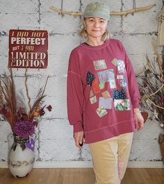 "Oversized with dropped shoulder style, Large Old Navy, lightweight sweatshirt in maroon red color, embellished with cotton patchwork in the front. Each patch was sewn on using a different decorative machine stitch with green thread for contrast.  Split open on both sides.  More fraying may occur with each wash, simply cut the excess to your liking. Machine washed and tumbled dry before and after making.  Women's size - Oversized Large to X-Large Approximate measurements: All taken when laying f Oversized Red Cotton Sweater, Red Oversized Cotton Sweater, Cotton Sweatshirt With Patchwork In Relaxed Fit, Oversized Cotton Patchwork Sweater, Oversized Patchwork Cotton Sweatshirt, Long Sleeve Sweatshirt With Patches For Fall, Red Patchwork Sweatshirt For Fall, Oversized Long Sleeve Patchwork Sweatshirt, Casual Fall Sweatshirt With Patches