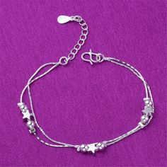 Celebrate sunny days by rolling up your cuffs to reveal this versatile anklet made light-catching with a shining silver plating. 9.84'' L Lobster claw clasp Silvertone copper Star Bracelet, How To Make Light, Fashion Korean, Watch Necklace, Ring Bracelet, Earring Necklace, Infinity Bracelet, Lobster Claw, Womens Bracelets