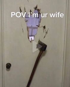 a hammer stuck in the middle of a door that says pov i'm ur wife