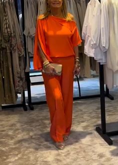 SPU: YSHHP242172 Style: casual Color: orange Season: spring/autumn Neckline: Strapless Sleeve Length: short sleeve Material: cotton Size: S/M/L/XL/2XL/3XL/4XL/5XL Top size:  Size Chart： Length Sleeve Length Bust CM inch CM inch CM inch S 49 19.3  19 7.6  100 39.4  M 50 19.7  20 8.0  105 41.3  L 51 20.1  21 8.3  110 43.3  XL 52 20.5  22 8.7  115 45.3  2XL 53 20.9  23 9.1  120 47.2  3XL 54 21.3  24 9.4  125 49.2  4XL 55 21.7  25 9.8  130 51.2  5XL 56 22.0  26 10.2  135 53.1  Pants size: Size Chart Orange Short Sleeve Sets For Spring, Casual Short Sleeve Sets For Fall, Orange V-neck Summer Set, Casual Orange Workwear Sets, Casual Stretch Orange Sets, Casual Orange Stretch Sets, Casual Orange Sets For Day Out, Orange V-neck Sets For Spring, Chic Orange Set For Spring