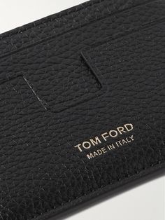 TOM FORD's cardholder has been crafted in Italy using the same careful attention to detail the label applies to its impeccable tailoring. Simply detailed with gold branding, it's made from full-grain leather and fitted with four card slots, two of which are notched for easier access. Luxury Leather Card Holder With Card Slots, Luxury Leather Card Holder With Slots, Designer Wallets With Engraved Logo For Professional Use, Designer Bifold Card Holder For Business, Designer Business Wallets With Engraved Logo, Elegant Leather Business Card Holder, Designer Bifold Business Card Holder, Classic Tan Business Wallets, Formal Rectangular Card Holder With Engraved Logo