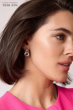 Elegant and glamorous, these sparkling hoops are sure to steal the show! You'll love wearing these shiny bright earrings that incorporate smooth and textured layers featuring crystal stones. Wear to special events or as everyday wear. Color: Silver Crystal Trendy Cubic Zirconia Crystal Earrings, Metal Crystal Earrings With Sparkling Stones, Trendy Sparkling Hoop Earrings, Modern Hoop Earrings With Sparkling Stones, Sparkling Stone Drop Clip-on Earrings, Glamorous Sparkling Stones Clip-on Earrings, Feminine Gold Hoop Earrings For Party, Chic Cubic Zirconia Crystal Earrings, Bright Earrings